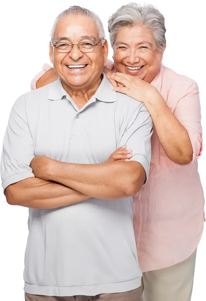 Smiling couple with dentures at Bell Road Dentistry